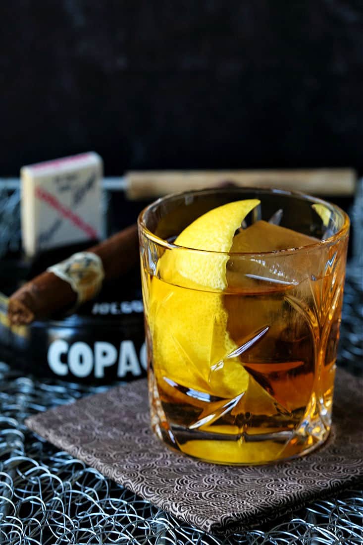 the godfather cocktail with a lemon twist