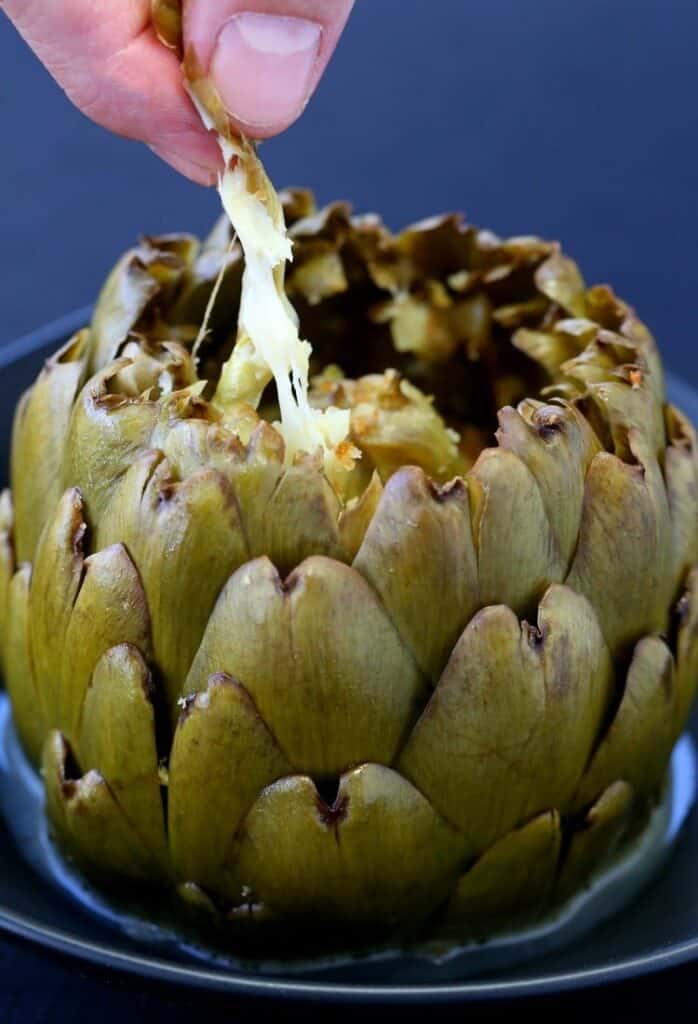 There's tons of flavor - and tons of cheese in these Stuffed Artichokes with Garlic and Fontinella!