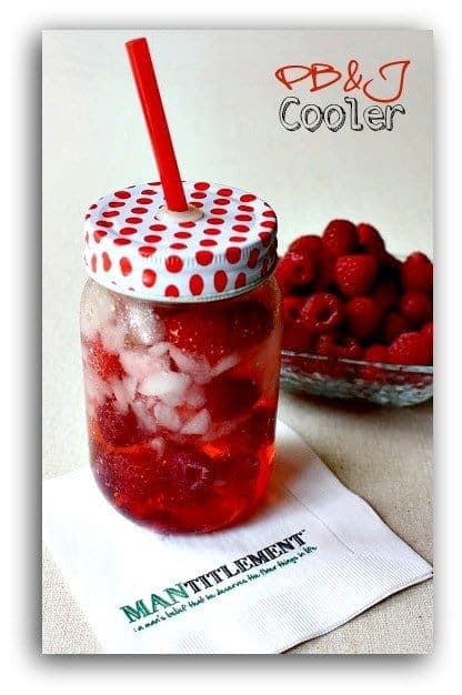 This Peanut Butter and Jelly Drink is super fun for parties and barbecues! Nut flavored vodka mixed with raspberry liquor and fuzzy seltzer! PB&J cooler cocktail