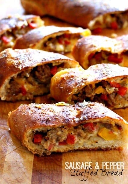 sausage and pepper bread on a board