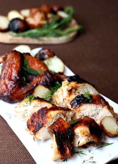 sliced beer can chicken on a platter