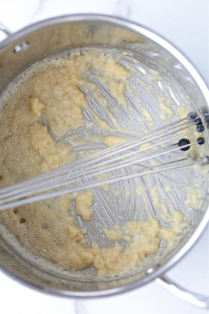 roux in a pot with a whisk