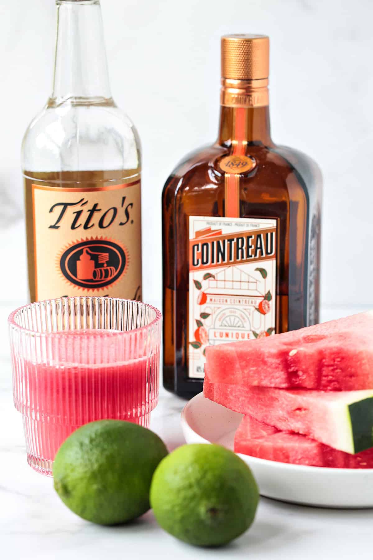 This Watermelon Cosmopolitan is the ultimate summer drink! So light and refreshing, made with fresh watermelon juice and a hint of lime! ingredients for making a watermelon cosmopolitan