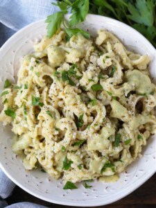 pasta in a bowl with creamy zucchini pasta sauce