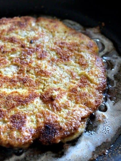 chicken parm pizza in pan frying