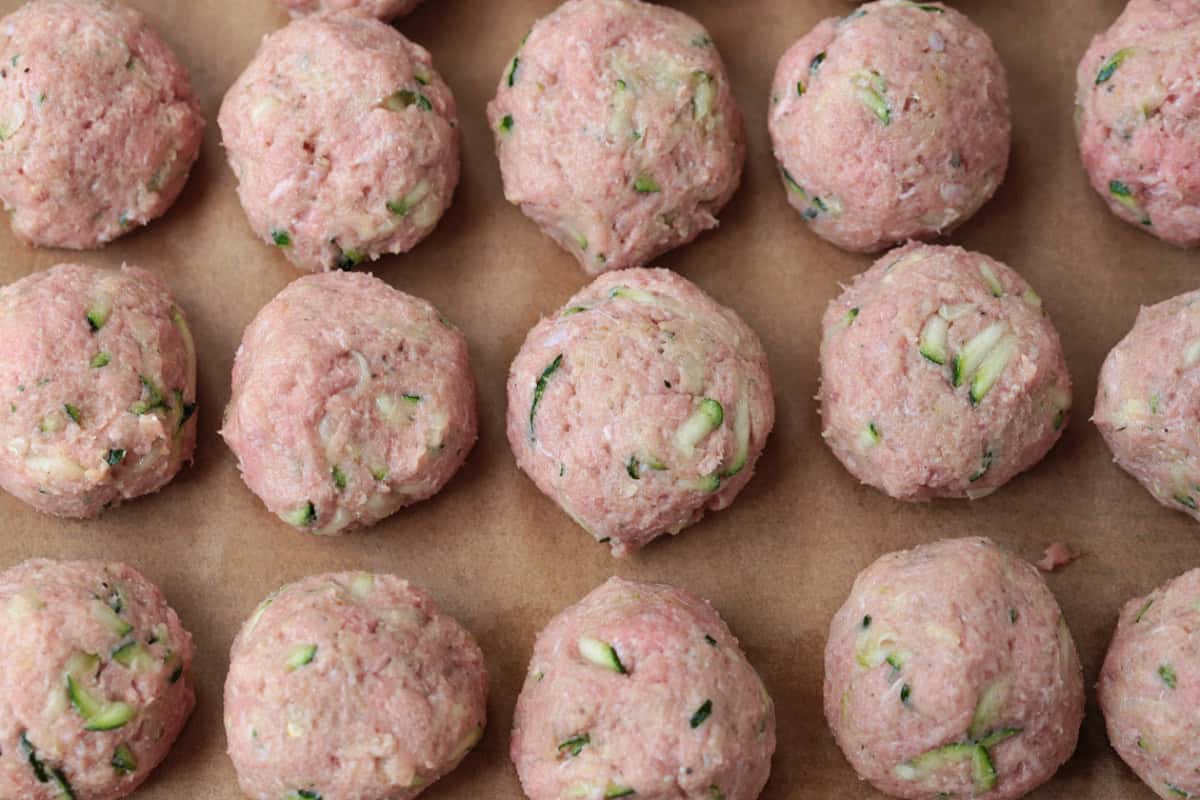 turkey meatballs on a sheet pan before baking