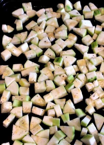 zucchini chopped on a sheet pan