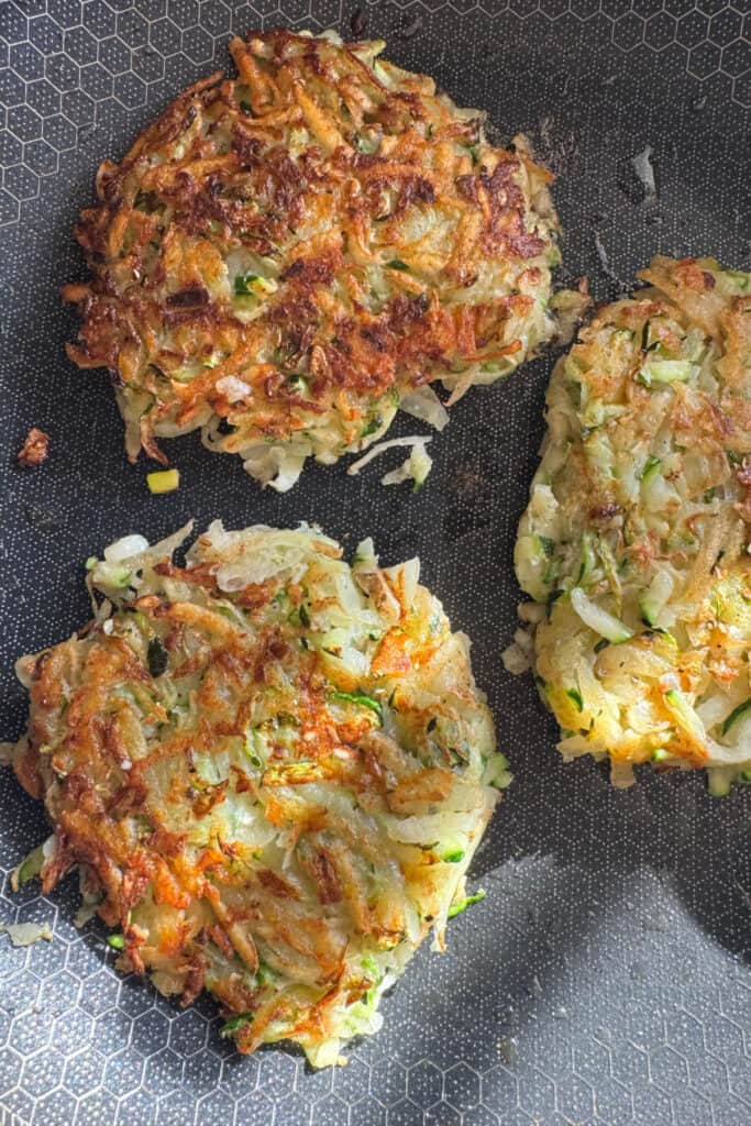 cooked hash browns in a skillet