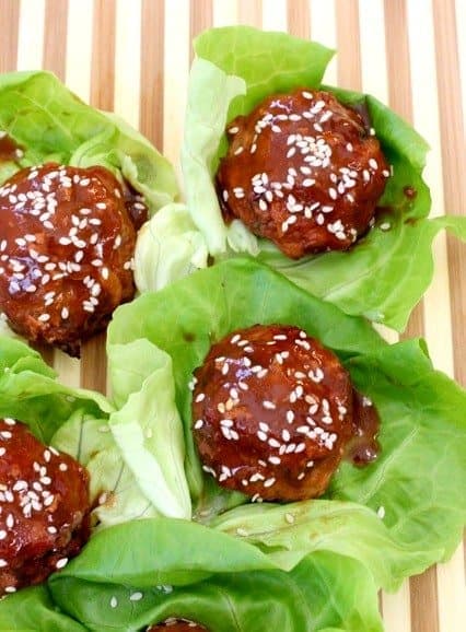 Asian style meatballs on lettuce beds