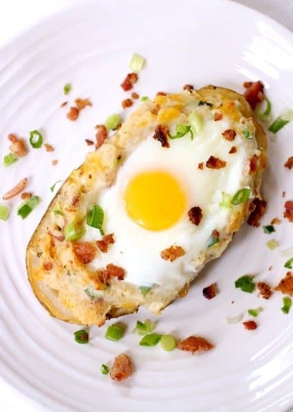 twice baked bacon and egg potatoes on a plate