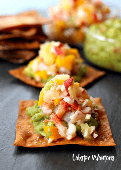 lobster wontons on a slate board