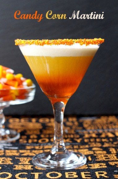 This Candy Corn Martini is WAY too delicious to save for Halloween! This layered martini tastes just like liquid boozy, candy corn! Candy Corn Martini, a layered drink recipe