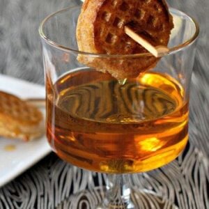 maple 43 cocktail with waffle garnish