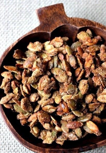 bourbon glazed pumpkin seeds in bowl