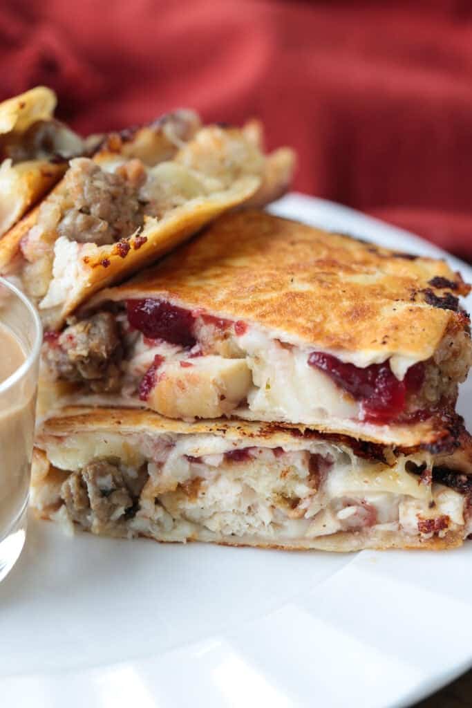 quesadillas with leftover turkey and stuffing on a plate with gravy