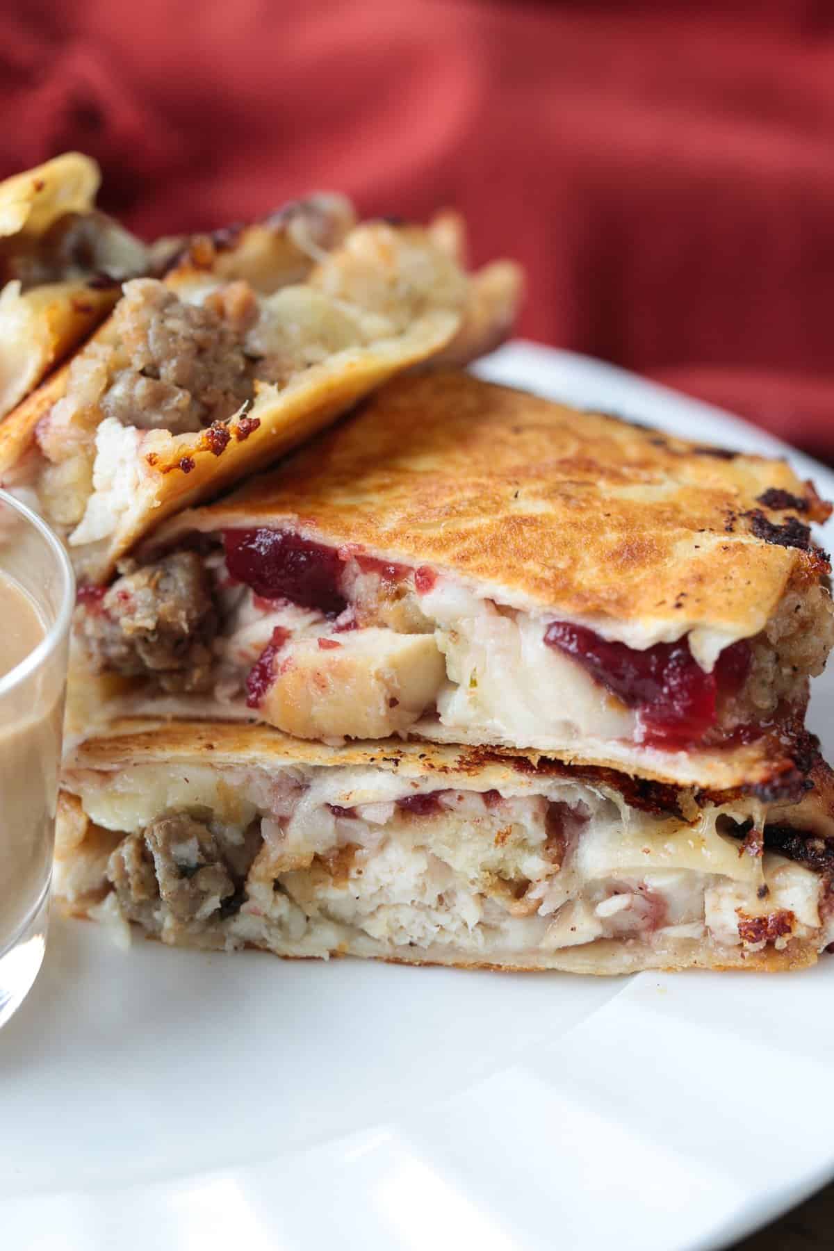 quesadillas with leftover turkey and stuffing on a plate with gravy