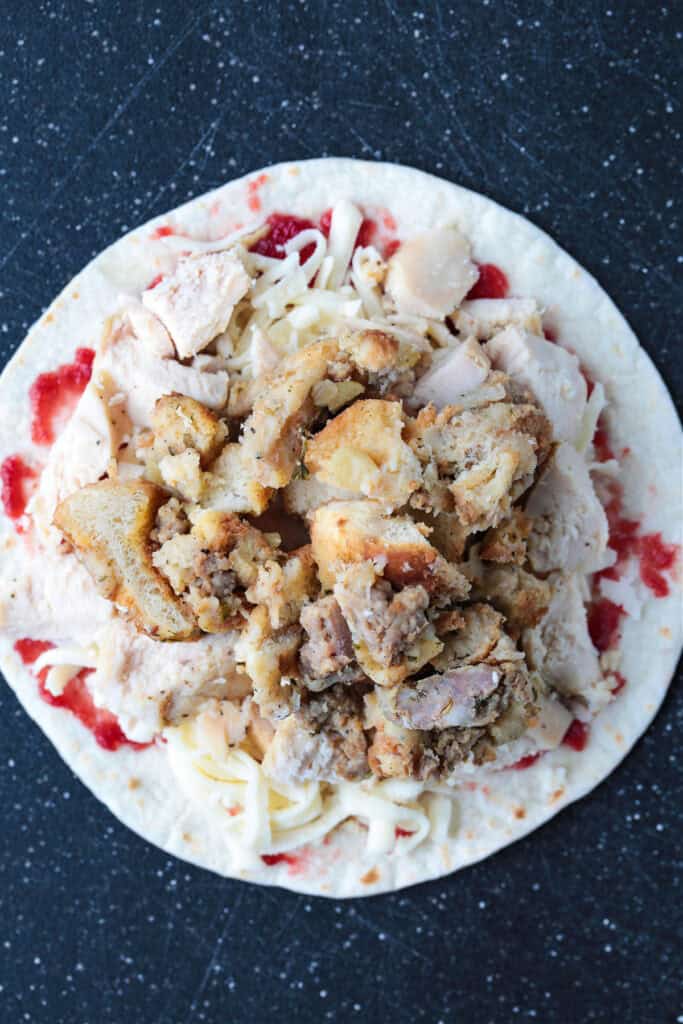 tortilla with cranberry sauce, stuffing and cheese