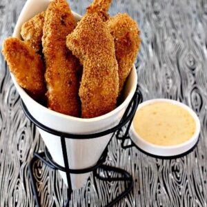 baked chicken fingers in a basket