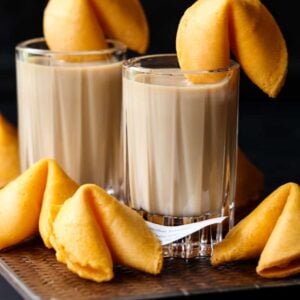 fortune cookie shots on a board with cookies