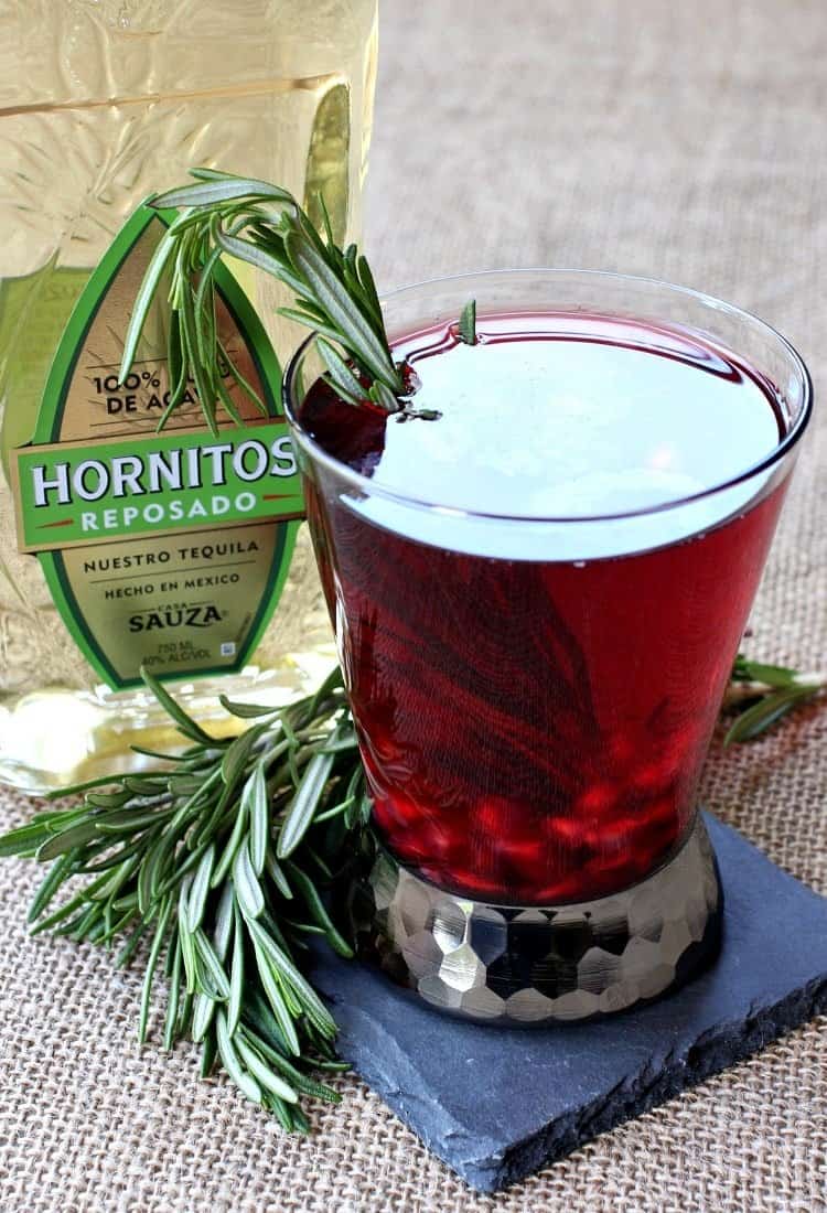 This Pomegranate Tequila Cocktail is the drink that makes everyone love tequila! Tart and sweet pomegranate juice mixes perfect with tequila! This Rosemary Reposado might turn you into a tequila lover!