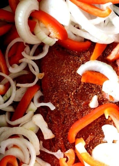 Crock Pot Steak Fajitas are one of the easiest way to make authentic tasting beef fajitas with only a few minutes of prep time! steak and peppers for fajitas