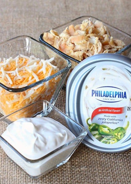 This creamy and spicy Buffalo Chicken Dip is an easy appetizer recipe that only takes 5 minutes of prep! Perfect for game days or any party, just pop it in the oven for a few minutes and it's ready to serve! Buffalo Chicken Dip is an easy appetizer recipe with just a few ingredients