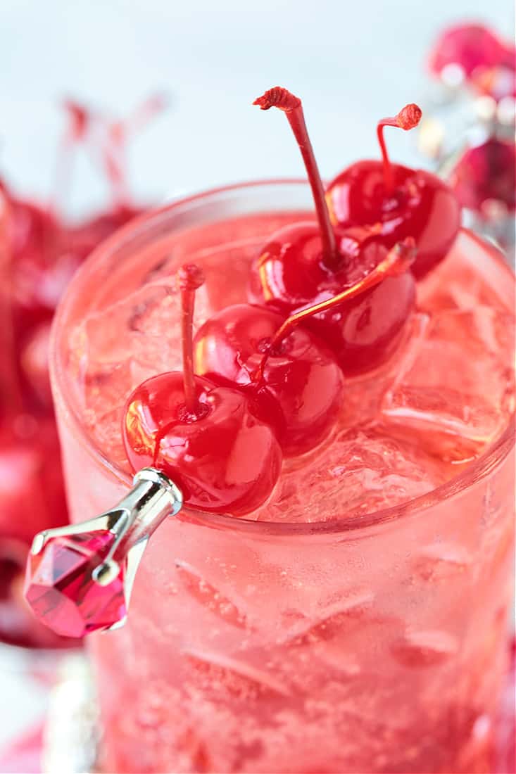 Cherries on a Dirty Shirley cocktail