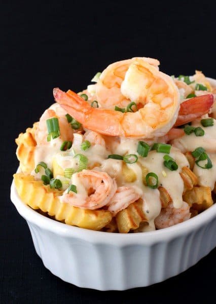 Shrimp Poutine in a white dish