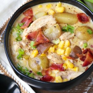 chicken corn chowder in a bowl with napkin