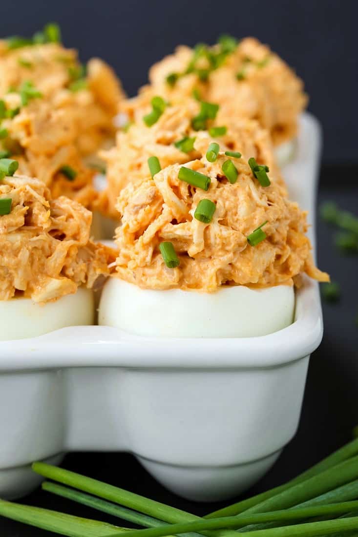 Buffalo Chicken Stuffed Eggs are an appetizer recipe made with chicken salad stuffed in a hard boiled egg