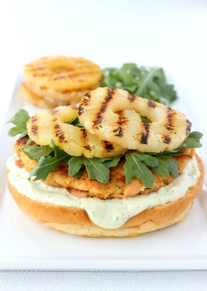 A Salmon Burger with pineapple on top