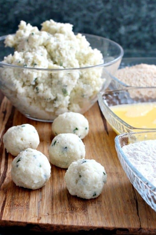 mashed potato balls on a board