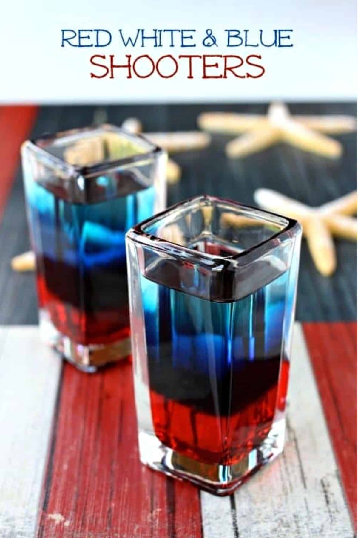Make up a batch of these Red White and Blue Shooters for your BBQ parties this summer! Everyone is going to love these patriotic vodka shots! layered red, white and blue shots