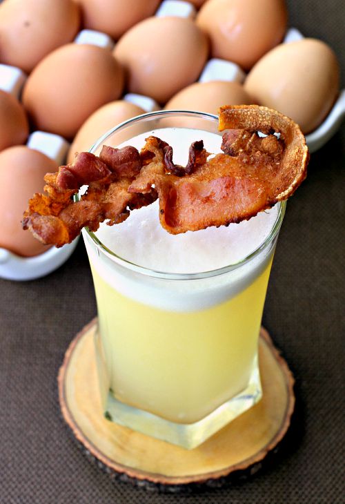 Bacon Gin Fizz cocktail with bacon garnish