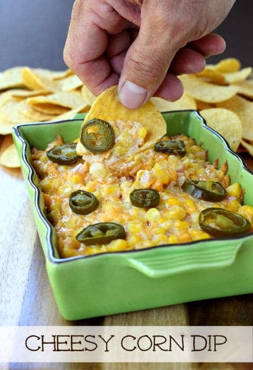 Hot Corn Dip is an easy, cheesy appetizer for parties! You probably have everything you need to make this dip right in your fridge! Cheesy Corn Dip dip with chip