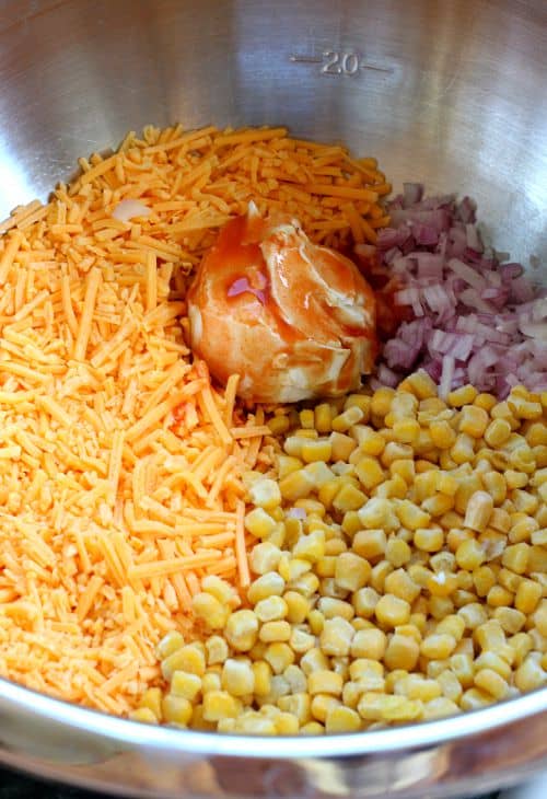 Hot Corn Dip is an easy, cheesy appetizer for parties! You probably have everything you need to make this dip right in your fridge! Cheesy Corn Dip ingredients