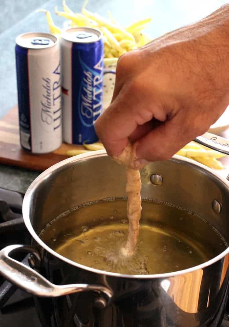 These crispy, Beer Battered Green Beans are a party favorite! Fried green beans in a light beer batter, dipped in a creamy barbecue sauce! Beer Battered Green Beans deep fry