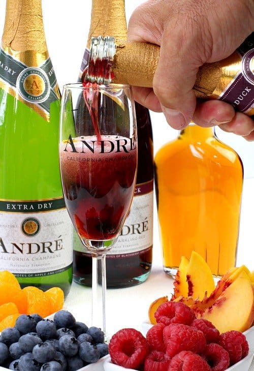 Pouring champagne for Champagne Sangria