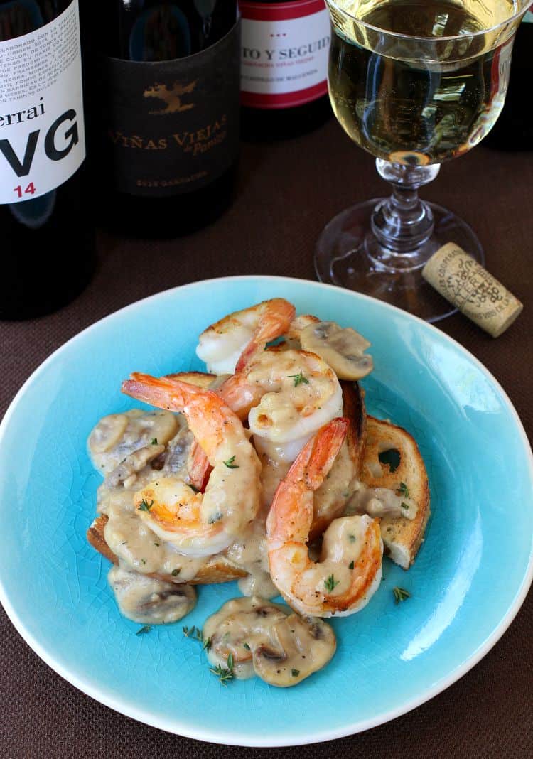 Make this delicious Shrimp with Cream Sauce for a dinner party or a date night at home! Anyone will be impressed with this delicious shrimp dinner! Shrimp Toast with Cream Sauce on plate