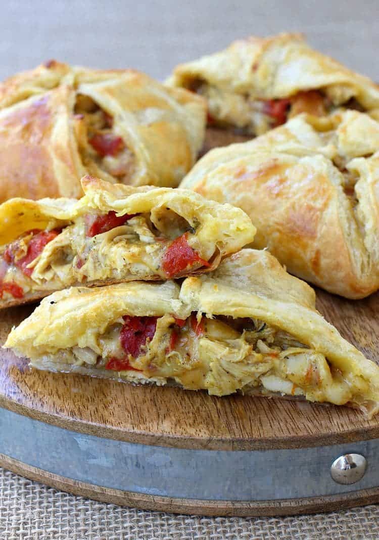 Green Chile Chicken Hand Pies are filled with a cheesy chicken filling that has just the right amount of heat! These are great for appetizers or dinner! hand pies with chicken and green chilis