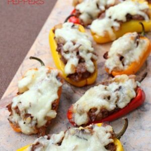 mini stuffed peppers on a board