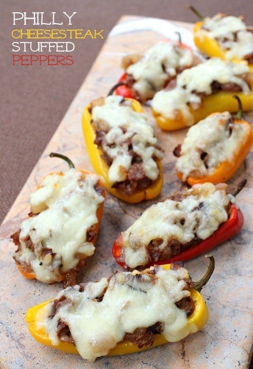 mini stuffed peppers on a board