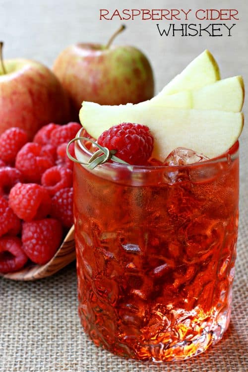 This Raspberry Cider Whiskey is so delicious and refreshing! A whiskey cocktail for the warmer months, perfect for parties and BBQ's! Raspberry Cider Whiskey featured image