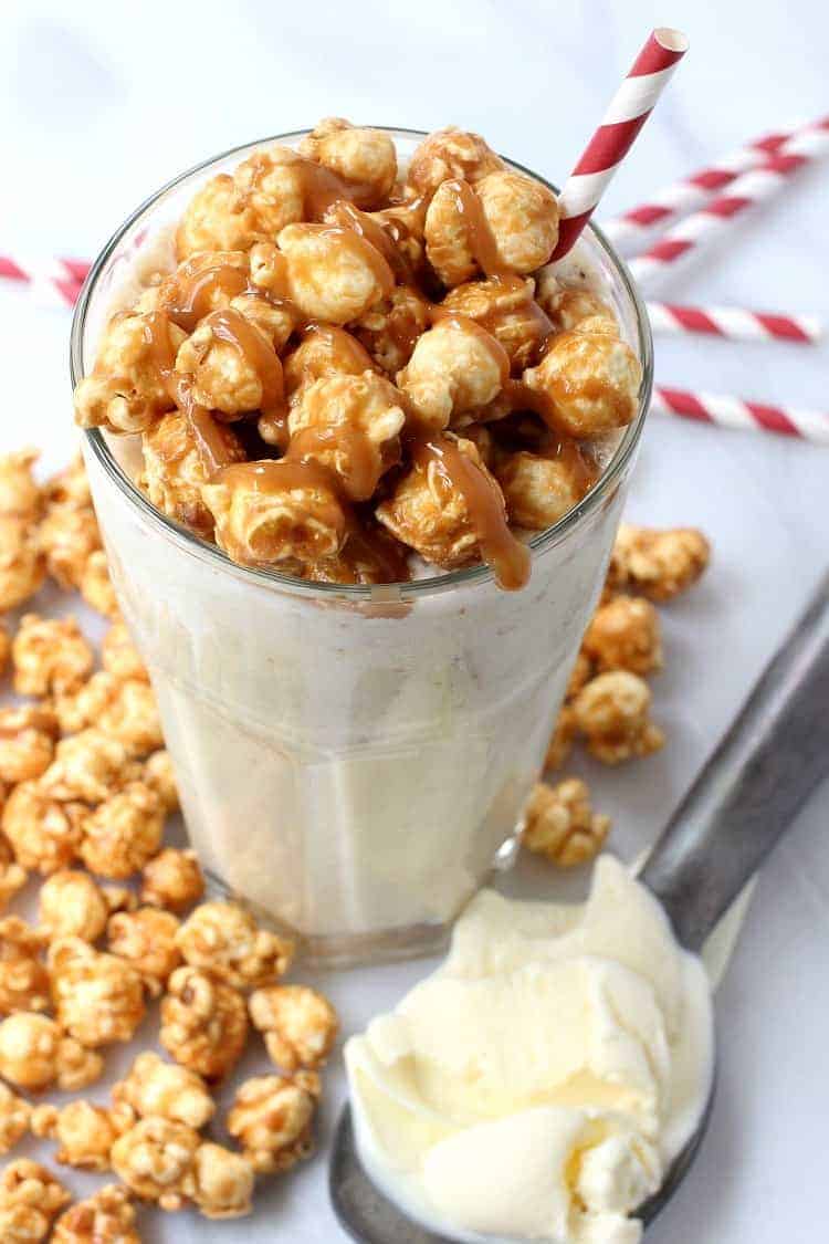 A Bourbon Caramel Corn Milkshake is super fun to serve at parties and on game days! Blend up this boozy milkshake instead of serving dessert! Bourbon Caramel Corn Milkshake in glass