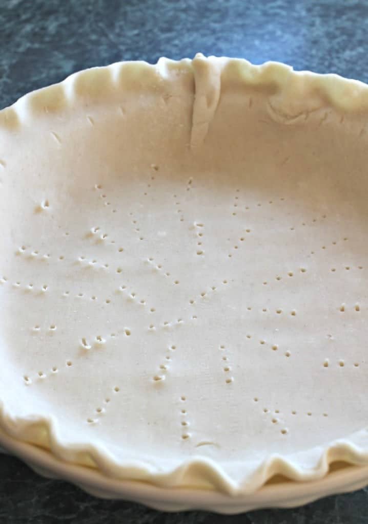 An uncooked pie crust or taco pie recipe