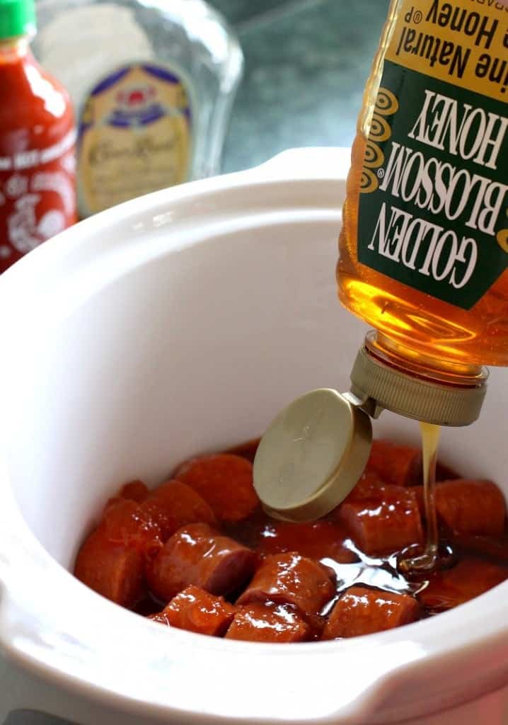 Crock Pot Sriracha Honey Kielbasa is an appetizer recipe made in a slow cooker