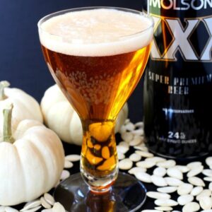 pumpkin beer cocktail with white pumpkins