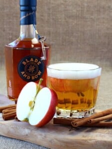 bourbon cocktail with apple garnish