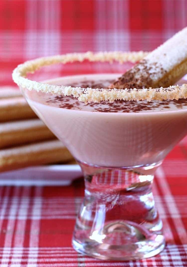 A creamy, sweet dessert cocktail that's perfect for the holidays! Make this Tiramisu Martini instead of dessert, or serve it with dessert! Tiramisu Martini featured with cookie