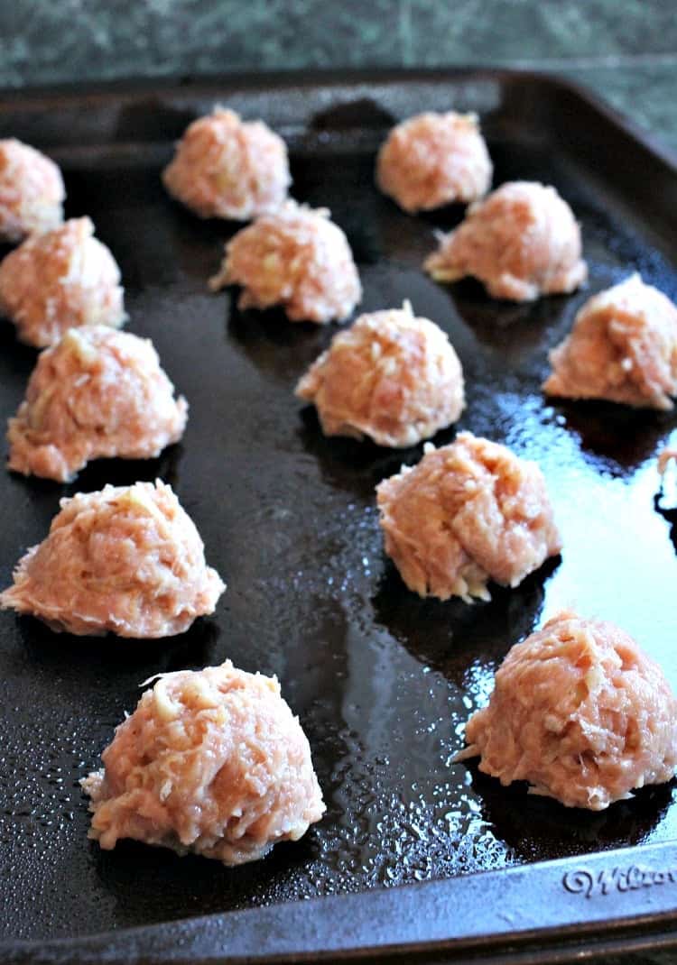 Make this Turkey Meatball Appetizer for your next party or holiday! An easy to make, make ahead appetizer recipe that everyone will love! turkey-apple-meatballs-whiskey-glaze-pan